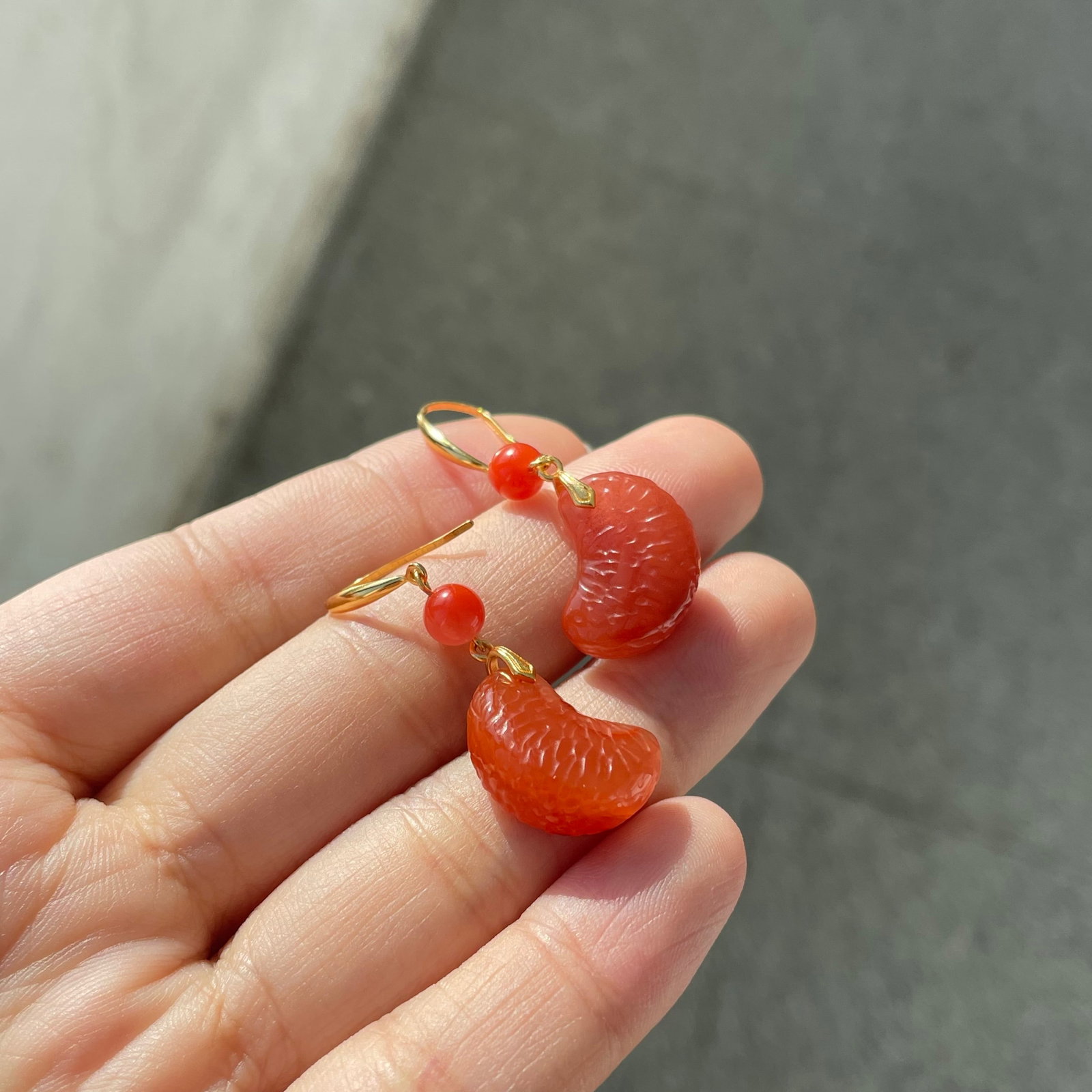 A Pair Silver Inlay Nanhong Agate Orange Earrings: Title: A Pair Silver Inlay Nanhong Agate Orange Earrings Origin: Chinese Date/Period: After2026 Materials: Silver,Nanhong Agate Dimensions: Reserve: $80.00 Shipping: Domestic: Shipping rates are
