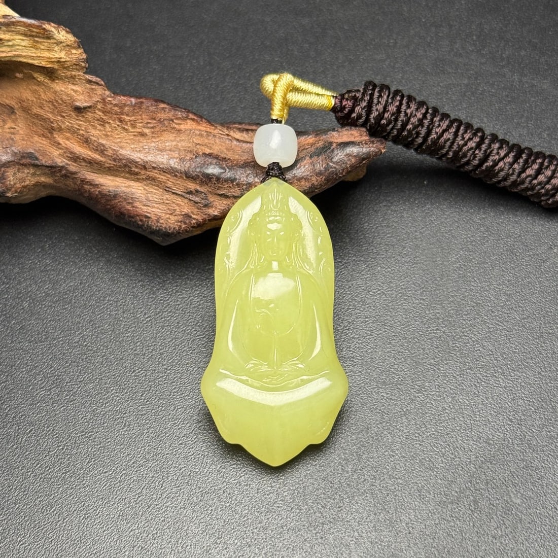 Hetian Jade Hand Carved Kwan-yin Pendant: Title: Hetian Jade Hand Carved Kwan-yin Pendant Origin: Chinese Date/Period: After2000 Materials: Hetian Jade Dimensions: 45x23x8(mm) 1.77x0.91x0.31(inches) Weight 0.04 lbs/16g Reserve: $369.00