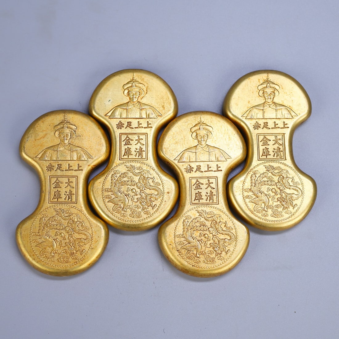 A Set Four Gold Ingot - 4