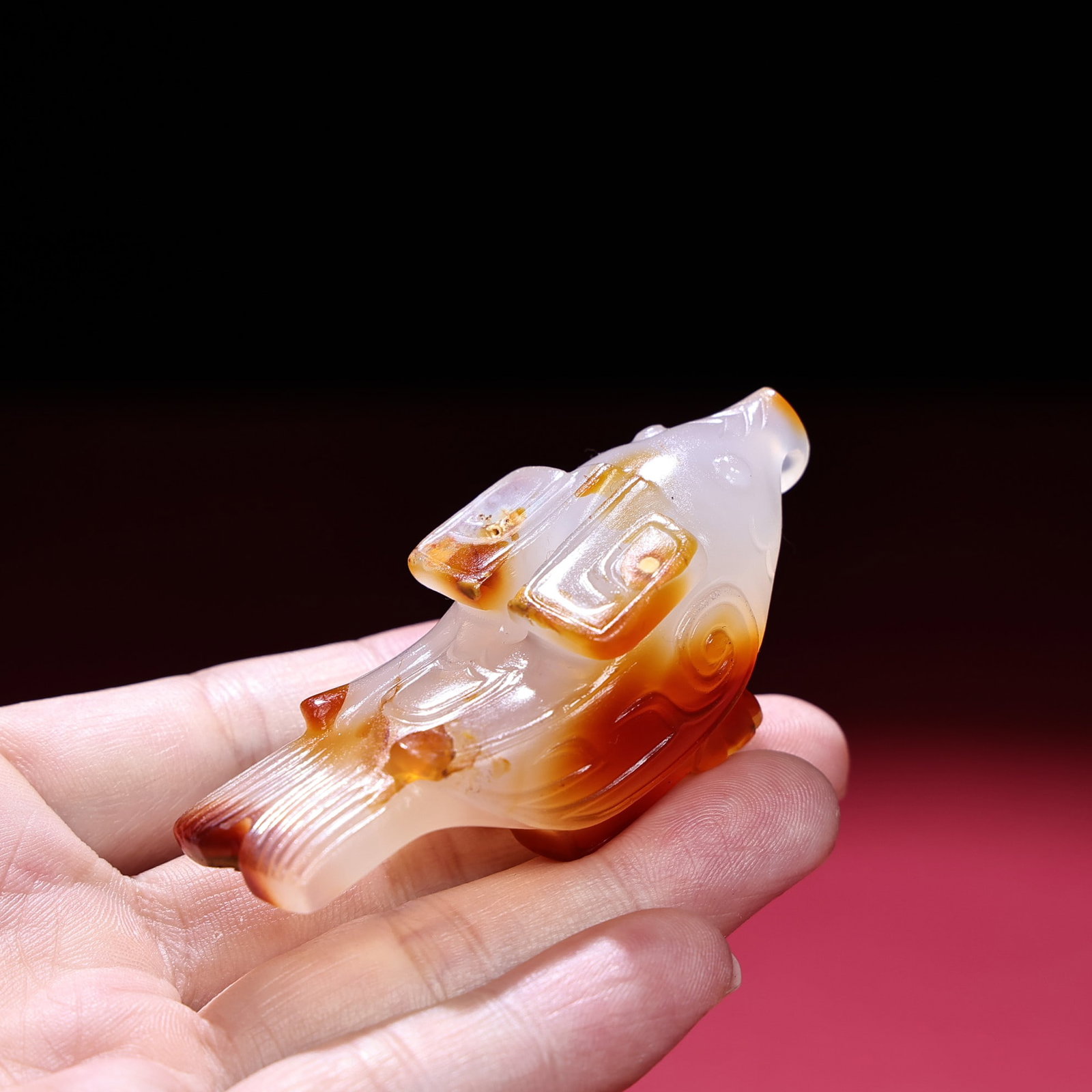 Agate Hand-Carved Pendant w Bird: Title: Agate Hand-Carved Pendant w Bird Origin: Chinese Date/Period: After2020 Materials: Agate Dimensions: 72 x 28 x 26 (mm) 2.83 x 1.10 x 1.02 (inches) Weight: 0.12 lbs/ 55 g Reserve: $389.00