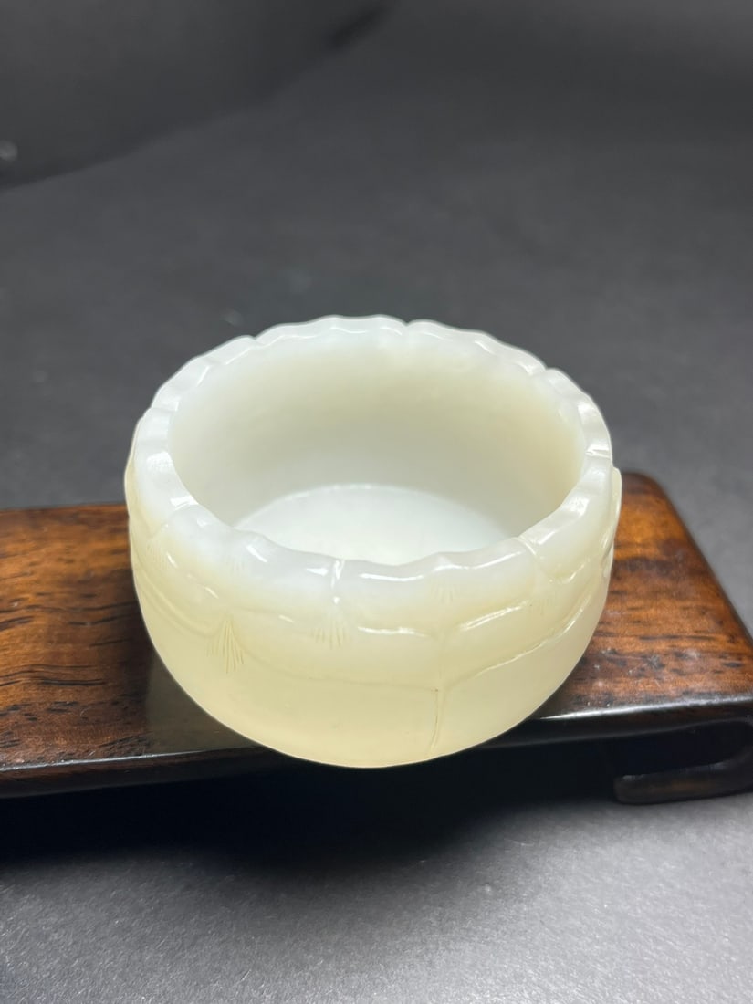 Natural Hetian Jade Hand-Carved Cup w Lotus Flower: Title: Natural Hetian Jade Hand-Carved Cup w Lotus Flower Origin: Chinese Date/Period: After1900 Materials: Hetian Jade Dimensions: 54 x 28 (mm) 2.12 x 1.10 (inches) Weight: 0.19 lbs/ 86 g Reserve: