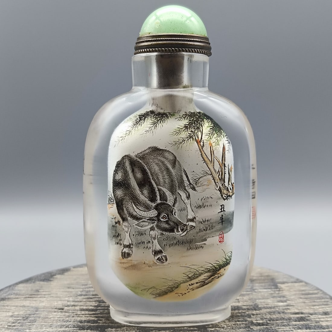 Peking Glass Inside Painting Fortune Ox Design Snuff Bottle w Stopper: Title: Peking Glass Inside Painting Fortune Ox Design Snuff Bottle w Stopper Origin: Chinese Date/Period: After1900 Materials: Peking Glass Dimensions: 93 x 52 x 28 (mm) 3.66 x 2.05 x 1.10