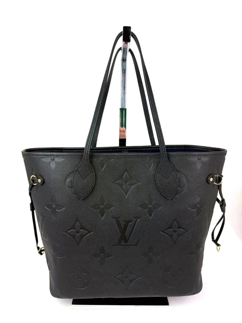 Louis Vuitton Neverfull MM Giant Monogram Black Empriente Leather Tote: Title: Louis Vuitton Neverfull MM Giant Monogram Black Empriente Leather Tote Description: 100% Authentic New Louis Vuitton Neverfull MM Giant Monogram Black Empriente Leather Tote RATING: New, not