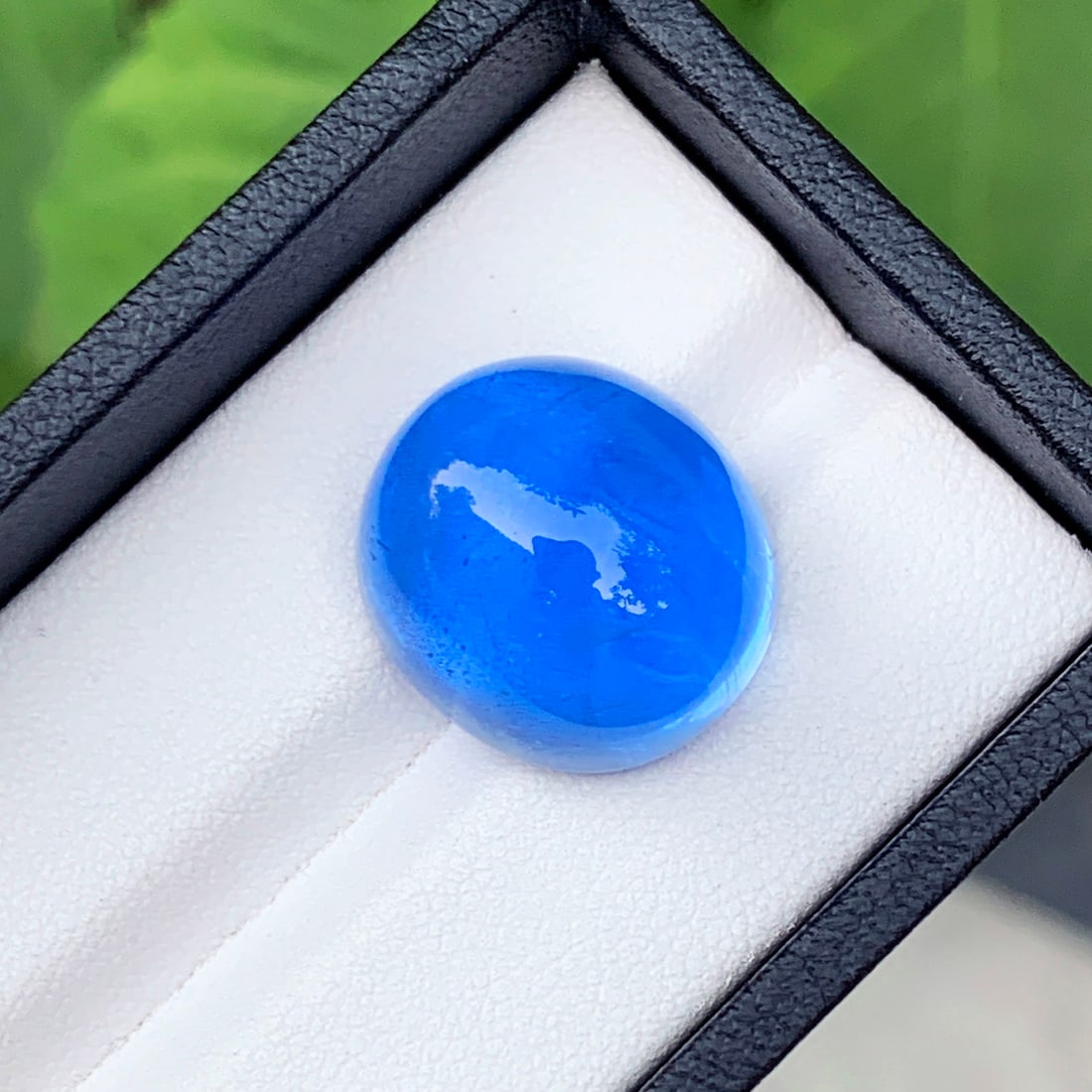 Natural Blue Beryl Cabochon, Deep Blue Aquamarine Stone For Jewelry Making: Description Natural Blue Beryl Cabochon, Deep Blue Aquamarine Stone For Jewelry Making Weight : 26.95 CT Dimensions : 18 x 17 x 12 MM Shape : Round Clarity : Included Color : Deep blue Treatment : Hea