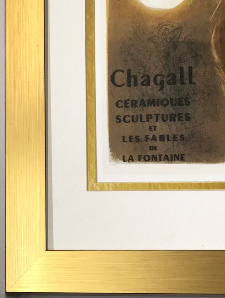 Marc Chagall Framed Lithograph 15 Kunsthouse Zurich 1959 Art in posters: Artist: Marc Chagall Country: Russia / France Title: Kunst house Zurich Medium: Lithograph -15 Marks: Not signed, not numbered Paper Size: vellum paper 9.5 x12.5 inch Printed: 1959 by Mourlot Freres, 