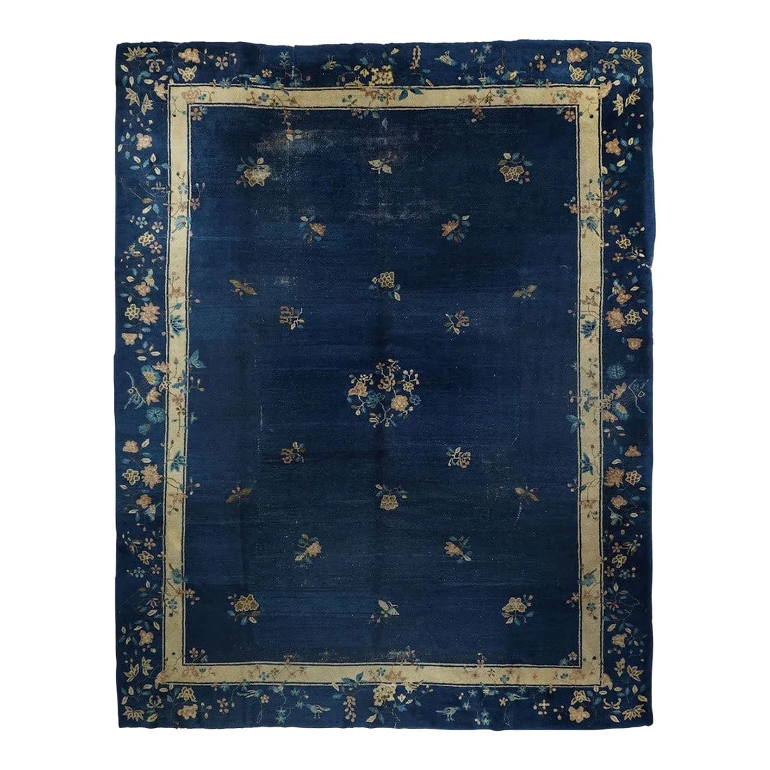 Antique Peking Rug 9'2'' x 11'8'': The dark blue ground is centered by a small, round, open medallion of paeony sprays, with widely spaced butterflies and lesser floral sprays on stems. Floral motives of the navy main border flow into 