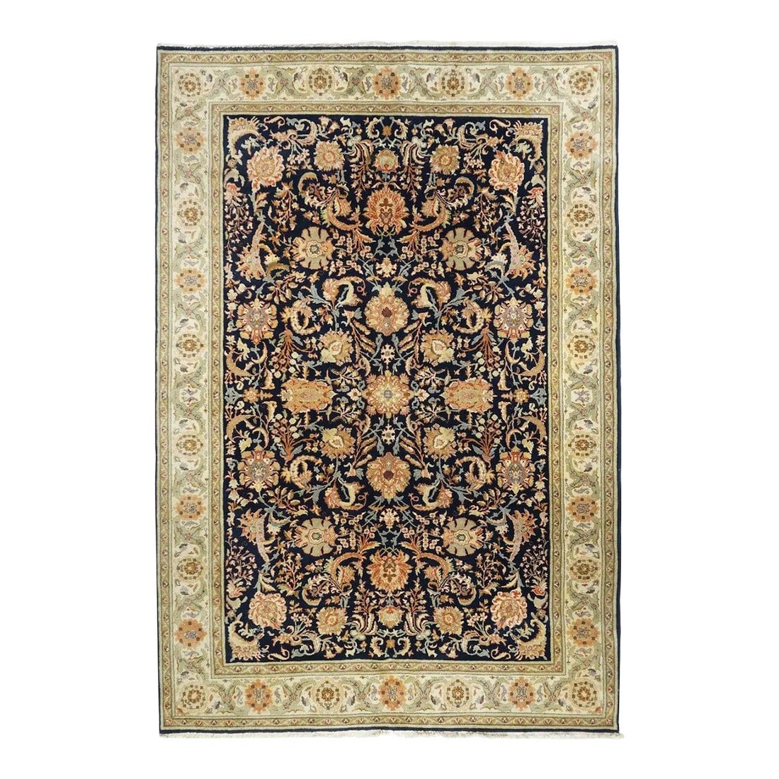 Contemporary Tabriz Rug 6'7'' x 9'10'': Northwestern Persia This urban carpet clearly shows a Heriz influence, with its semi-geometric drawing of a buff octofoil medallion centred by a light blue concentric sub-medallion. The ragged palette