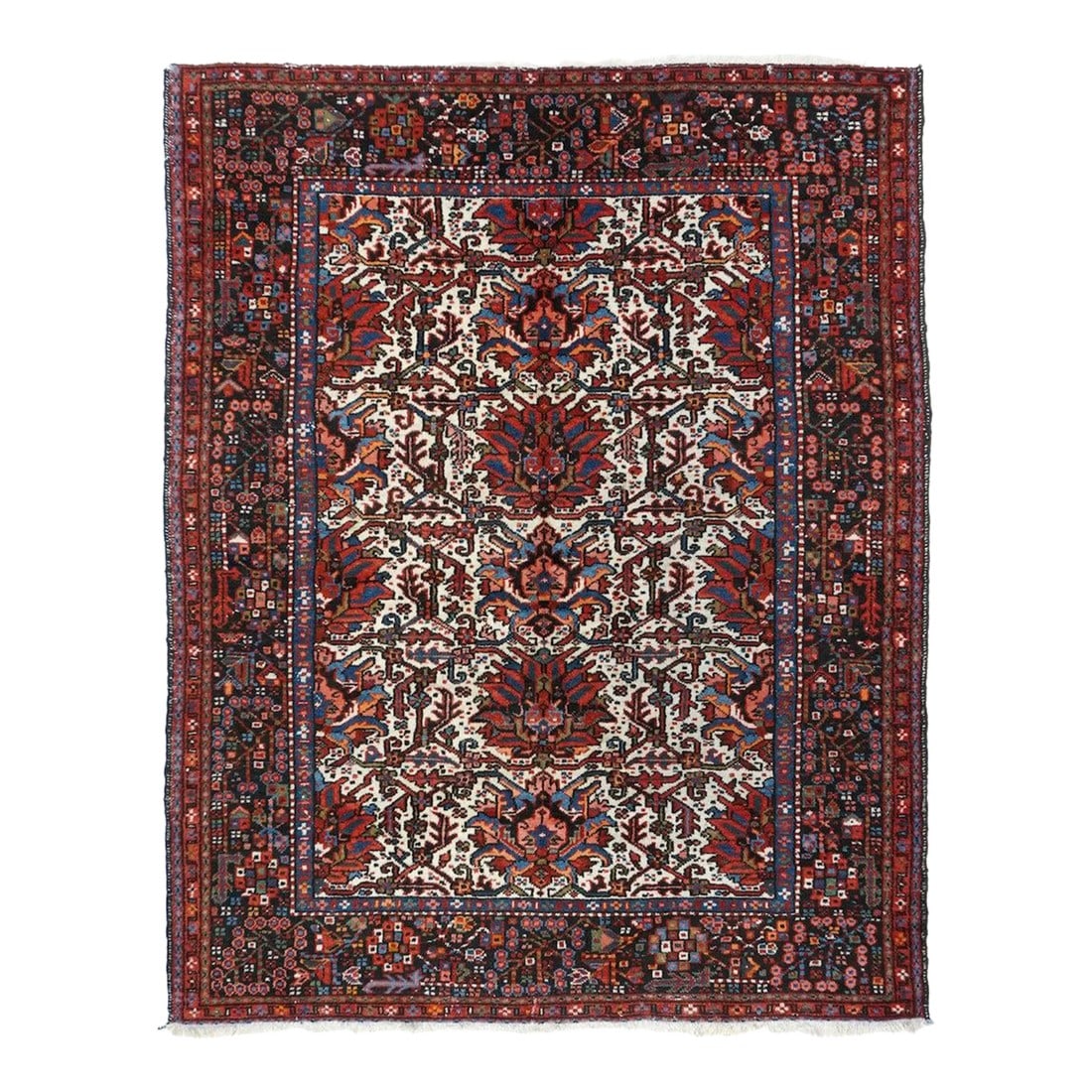 1960s Vintage Karajeh Rug 4'10'' x 6'2'': Not really and a fraction Karaja, but a genuine single-wefted Heriz scatter with an off white field displaying one complete and two half side columns, each of five and a fraction luxuriantly petaled p