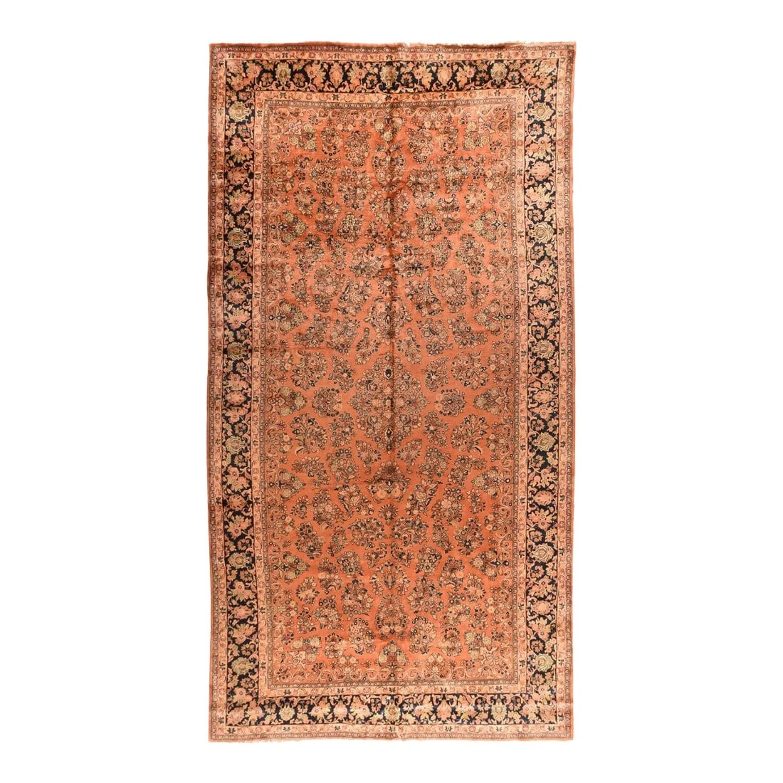 Antique Sarouk Rug 8'11'' x 17'8'': This 30's-40's west Persian robustly woven village carpet shows a rusty-rose field decorated by small, detached flower sprays in the iconic "American Sarouk" pattern. Navy border with palmettes and fl
