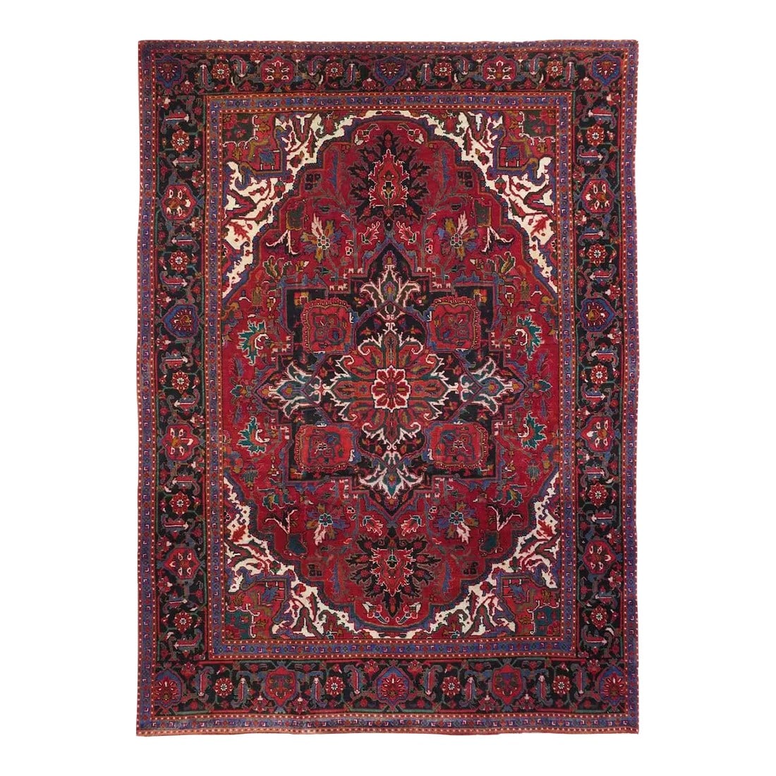 Vintage Heriz Rug 8'0'' X 11'6'': This relatively recent NW Persian, thick pile piece, shows a scalloped, elliptical red field hosting a bold navy octogrammme eight-palmette medallion with particularly emphatic layered palmette