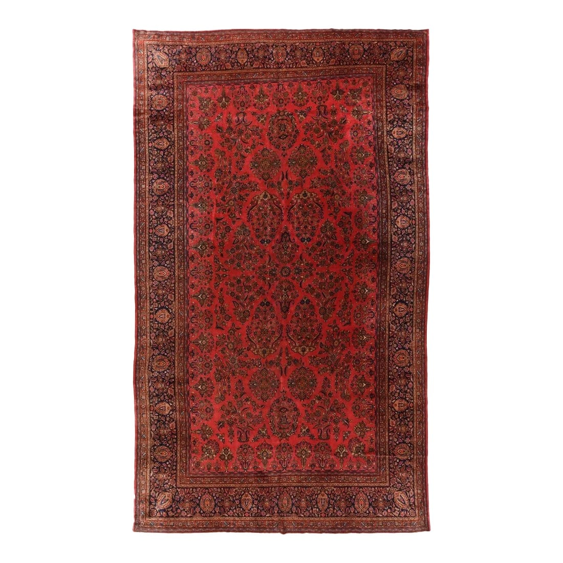 Antique Kashan Rug 10'1'' x 16'0'': This iconic large "American-style" Sarouk from Western Persia show a red field with a centred, but allover, pattern of detached floral sprays detailed in shades of blue. The contrasting navy border sh