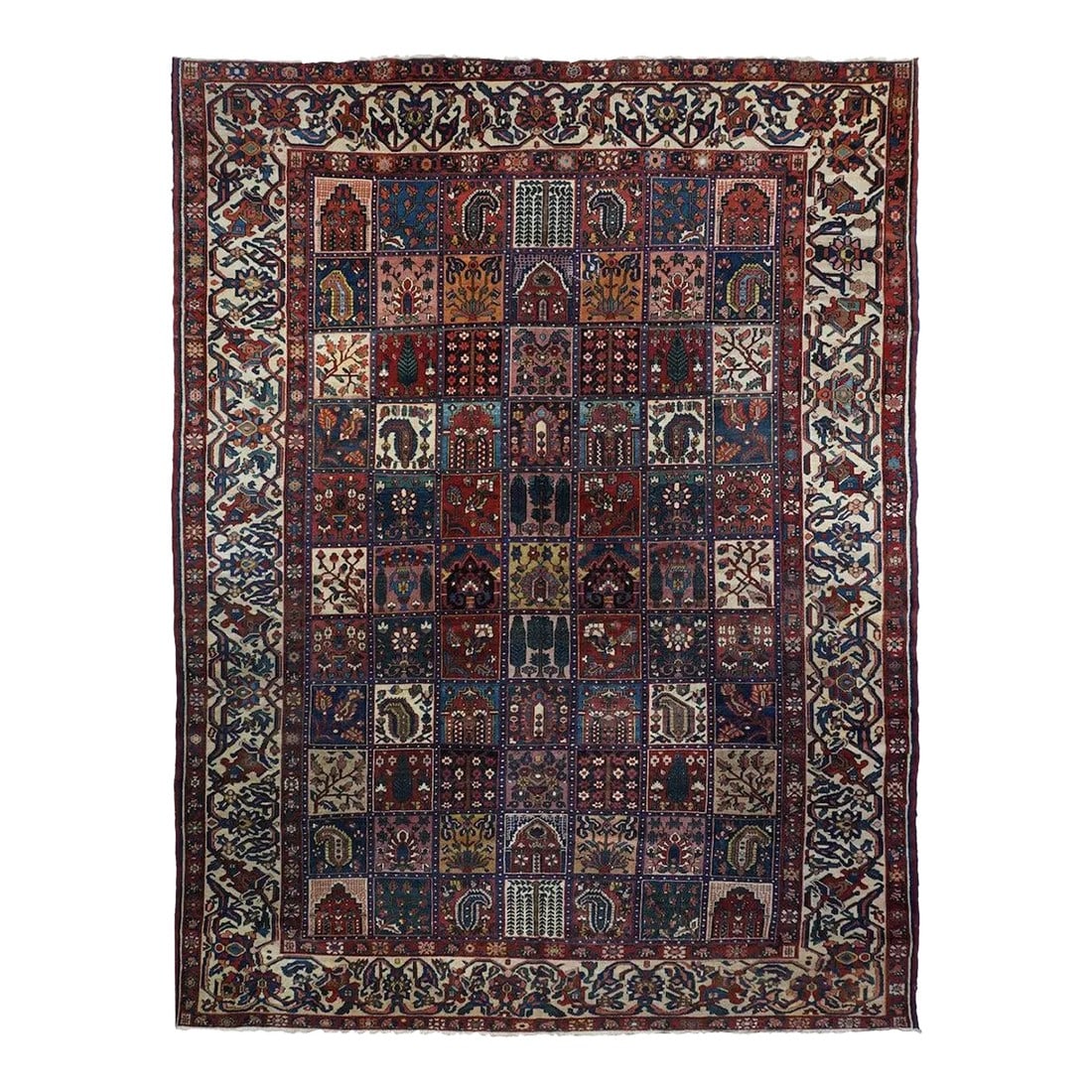 Antique Bakhtiari Rug 9'6'' x 13'0'': The iconic window pane panel "garden design" is interpreted in a seven by elven array featuring boteh, weeping willows, flowering branches, palmettes, arches, cypresses, irises and vases, on reserves