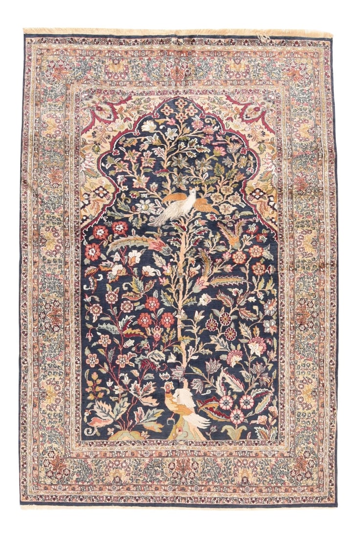 Hand Knotted Persian Tabriz Wool & Silk Rug: Northwestern Persia This urban carpet clearly shows a Heriz influence, with its semi-geometric drawing of a buff octofoil medallion centred by a light blue concentric sub-medallion. The ragged palette