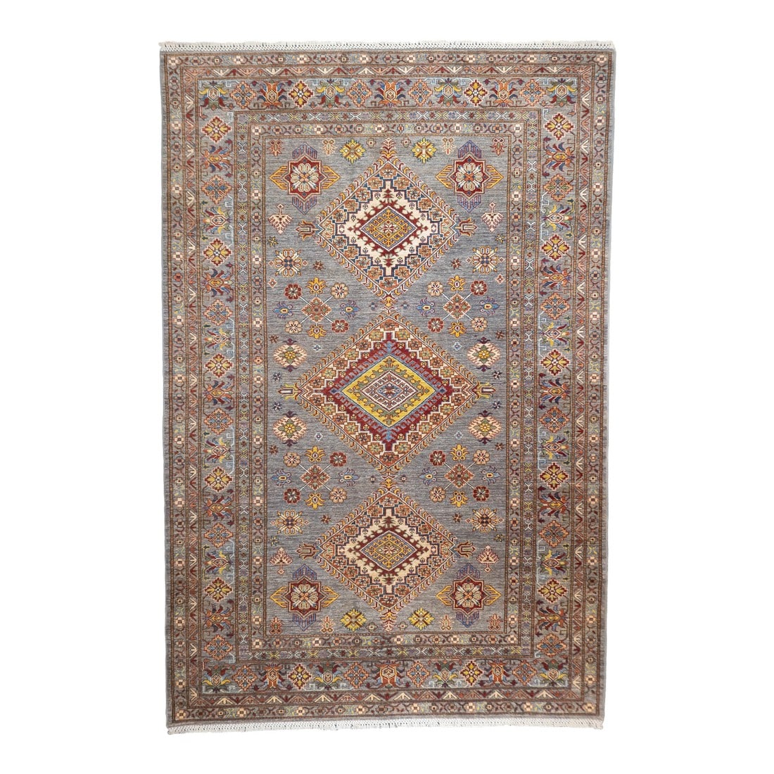 Fine Contemporary Pak Kazak Rug 6'0" X 9'0": Fine Contemporary PAK Kazak Rug 6'0" x 9'0". SW Caucasus/Armenia. Boldly patterned, strongly coloured, totally geometric, all wool, coarse to moderate weave, medium to long pile, scatter format pieces