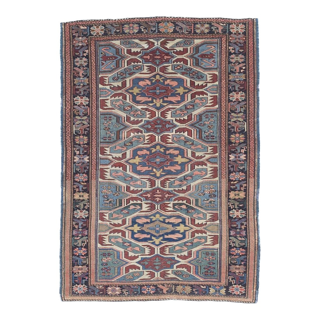 Fine Antique Caucasian Kuba Rug 3'7" X 5'1": This scatter shows the iconic Alpan design of four chaffers surrounding a flattened blue octogramme, repeated here three times forming a pole, with accents in light blue, teal and red, on an ecru