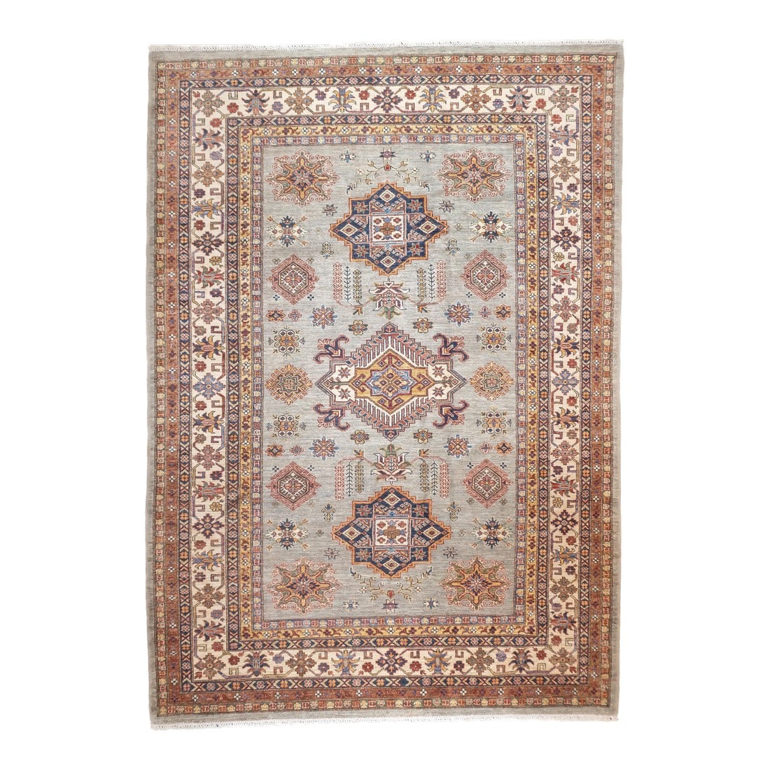 Pak Kazak Rug 6'9'' X 9'7'': PAK Kazak Rug 6'9'' x 9'7''. Pakistani post-WWII rug, generally scatters, with soft wool and curvilinear Persianate designs. Synthetic dyes, cotton foundations. Moderate to medium weaves. Condition: A