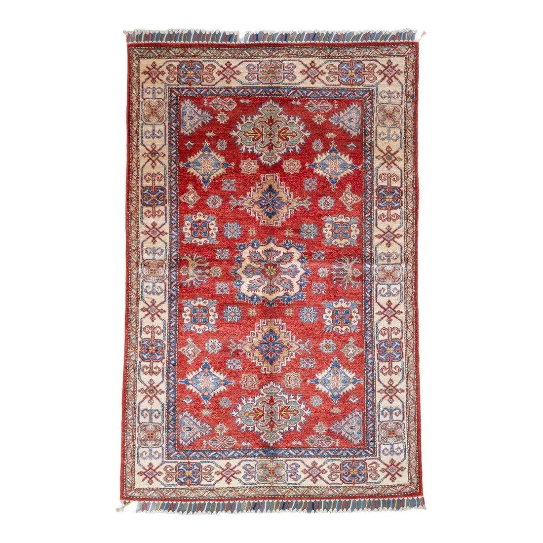 Pak Kazak Rug 3'10'' X 5'11'': PAK Kazak Rug 3'10'' x 5'11''. Pakistani post-WWII rug, generally scatters, with soft wool and curvilinear Persianate designs. Synthetic dyes, cotton foundations. Moderate to medium weaves. Condition:
