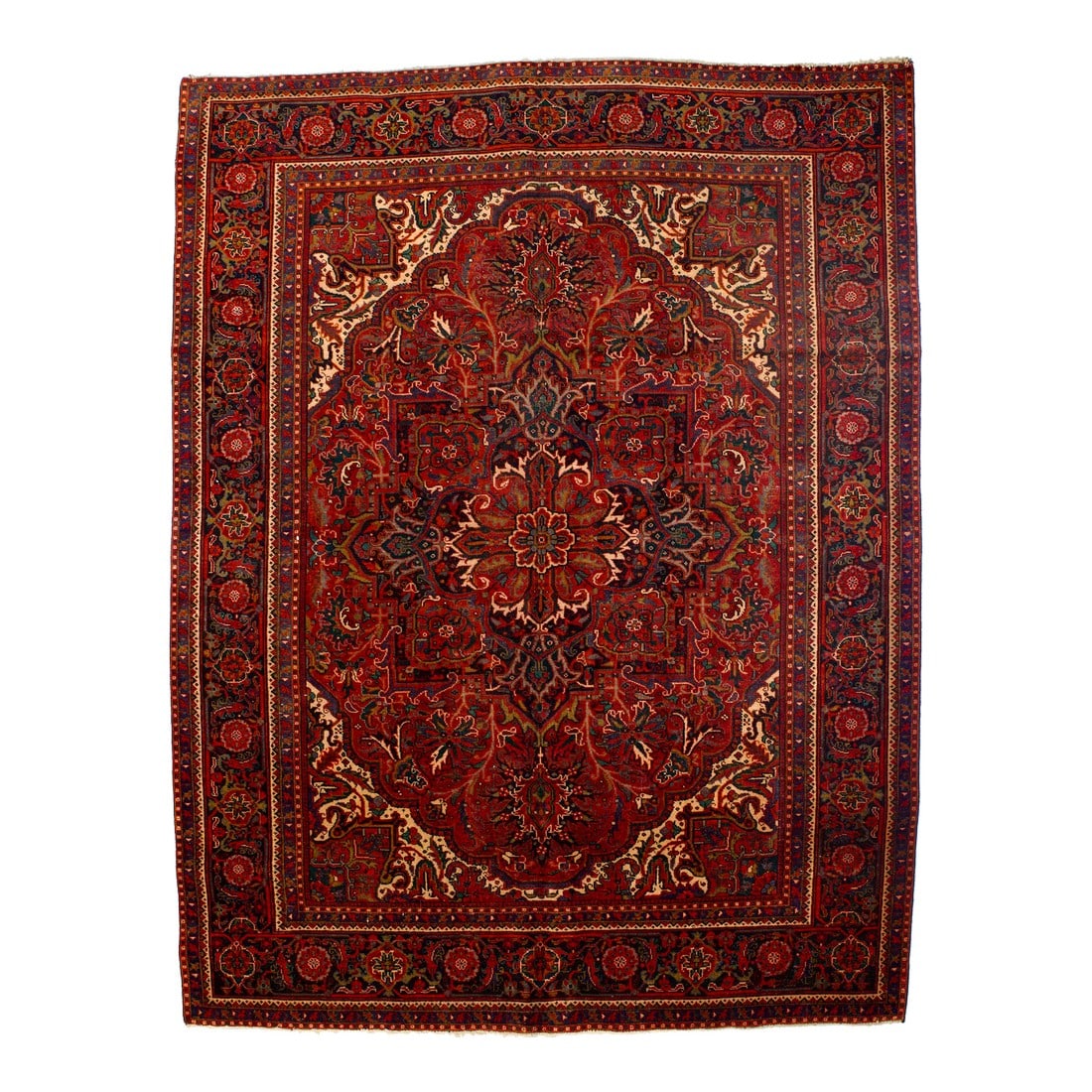 Vintage Persian Heriz Rug 9'6" X 12'5": Vintage Persian Heriz Rug 9'6" x 12'5". The numerous rugs of the famous NW Persian weaving district, from small scatters to giant carpets and a few runners, in semi-geometric medallion, centralised an