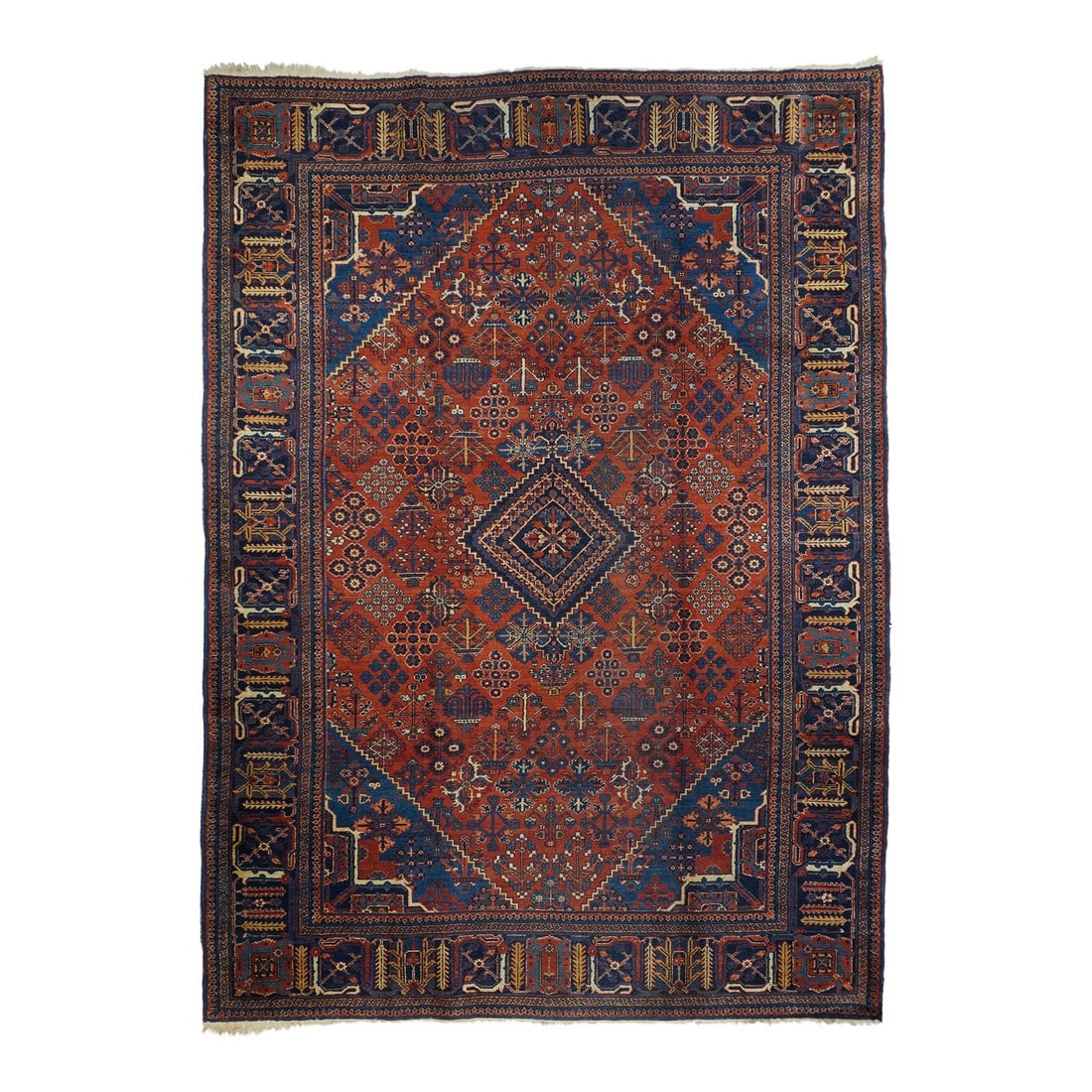 Vintage Persian Joshaghan Rug 7'3" X 10'3": Vintage Persian Joshaghan Rug 7'3" x 10'3". Definitely in the iconic Joshagan manner with a red field displaying flower, rosette arrays, and various cruciform elements, all in a floating lozenge