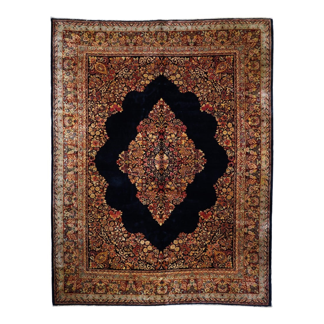Vintage Sarouk Rug 10'2'' X 13'1'': Vintage Sarouk Rug 10'2'' x 13'1''. The navy-black field displays a millefleurs open lozengoidal medallion with side pendants, deep and extended en suite corner sections, and a plain area in between. 