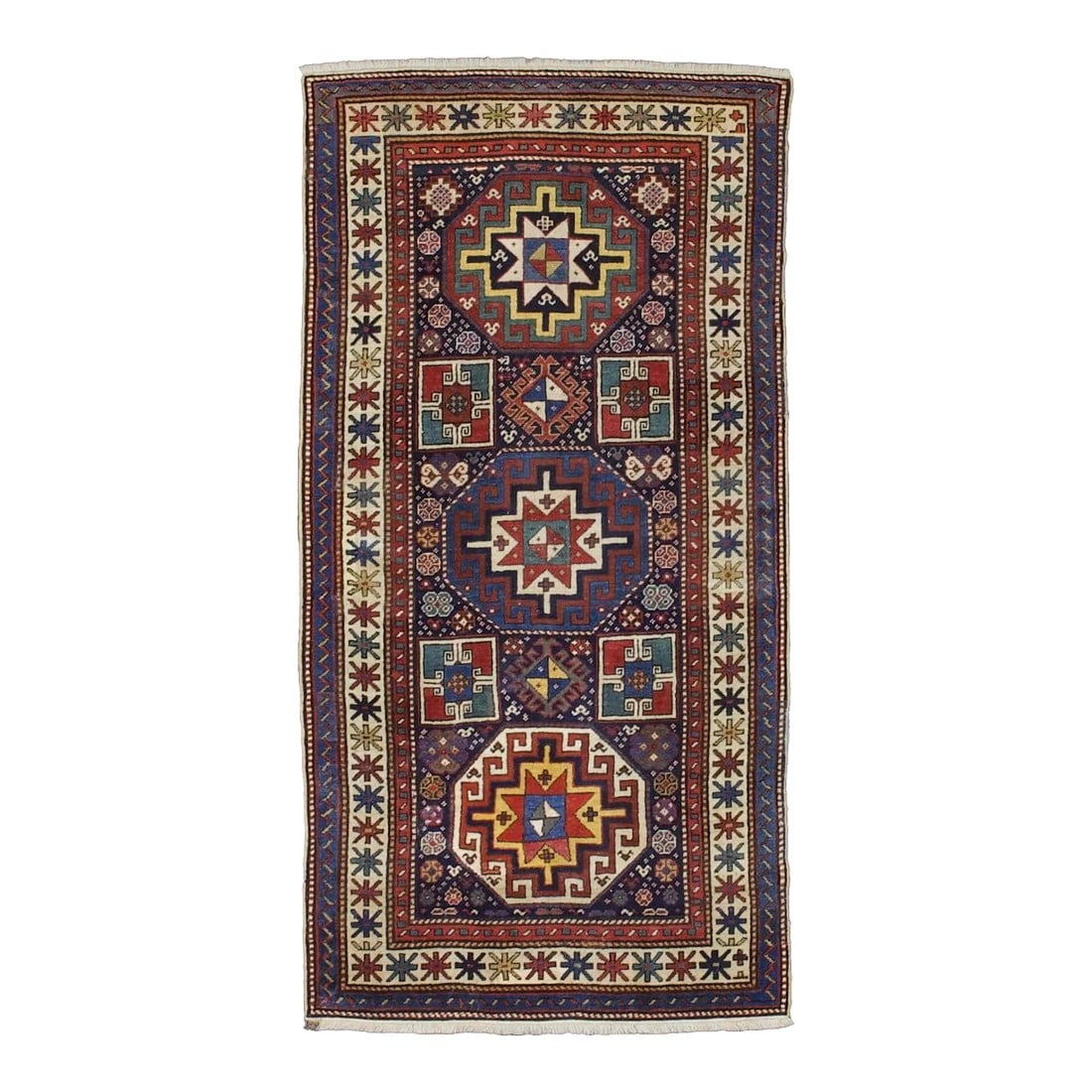 Antique Caucasian Kazak Rug 3'3" X 6'5": Antique Caucasian Kazak Rug 3'3" x 6'5". SW Caucasus/Armenia. Boldly patterned, strongly colored, totally geometric, all wool, coarse to moderate weave, medium to long pile, scatter format pieces, in
