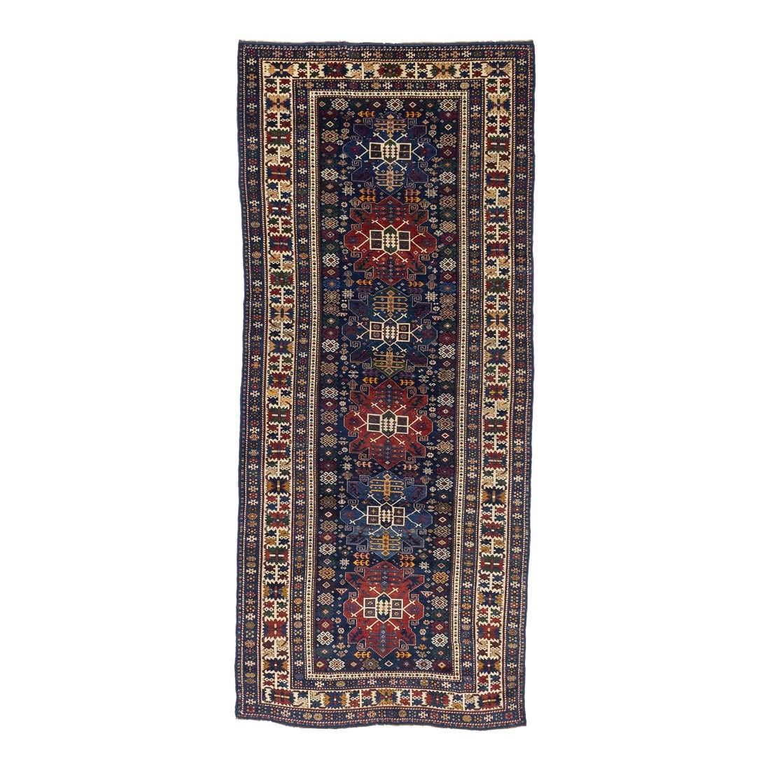 Antique Caucasian Shirvan Rug 4'1" X 9'10": Antique Caucasian Shirvan Rug 4'1" x 9'10". Eastern Caucasian, west Caspian Caucasian rugs, primarily scatters, in geometric layouts, some prayer, from a wide range of local villages. Marasali prayer 