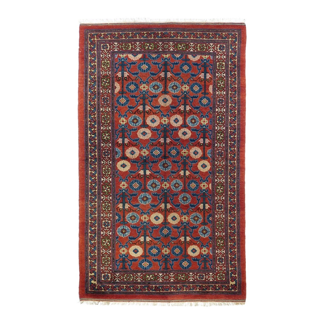 1940s Vintage Khotan Samarghand Rug 4'4'' X 7'4'': The warm rust-red field with a touch of orange, shows offset large triple posy flowers with blue leaves in a textile pattern running out in all directions. Several blues including a crisp lighter