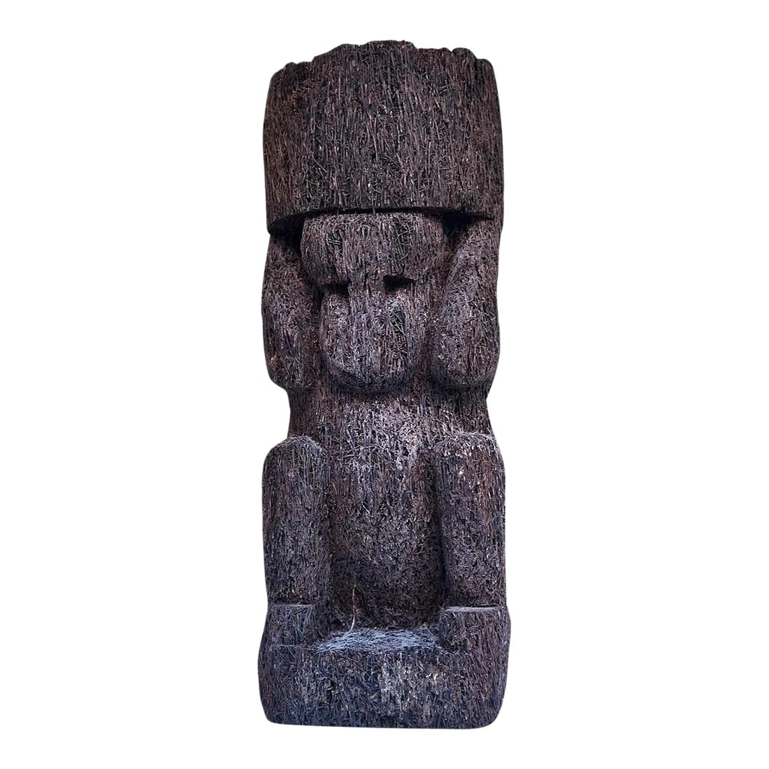 Mid 20th Century Polynesian Tiki Effigy Sculpture: This is a decorative Tiki or effigy sculpture. It is inspired by traditional Polynesian or Mesoamerican (Aztec/Maya) designs. It is often crafted from materials like tree fern trunks or a mix of