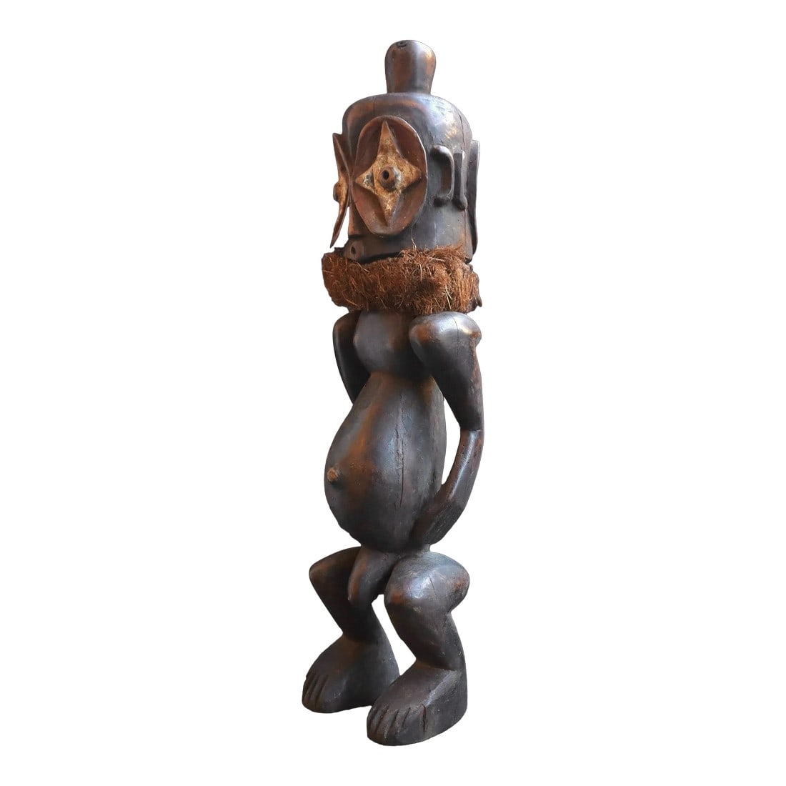 Mid 20th Century Songye/Yaka Ancestral Figure: This item is an African tribal art figure, likely from the Songye people of the Yaka people, used as an ancestral or divination object. Features a carved wooden body with a dark patina and a stylized