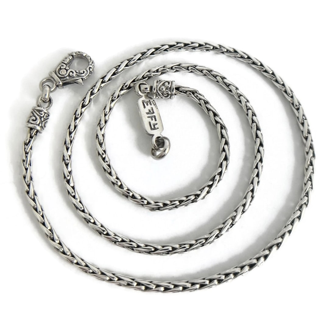Effy Braided Spiga Wheat Chain Necklace Sterling Silver, 18 Inches, 15.15 Grams: Effy Braided Spiga Wheat Chain Necklace Sterling Silver, 18 Inches, 15.15 Grams This is such a great necklace! Please let us know if you have any questions. Brand: Effy Metal: 925 sterling silver