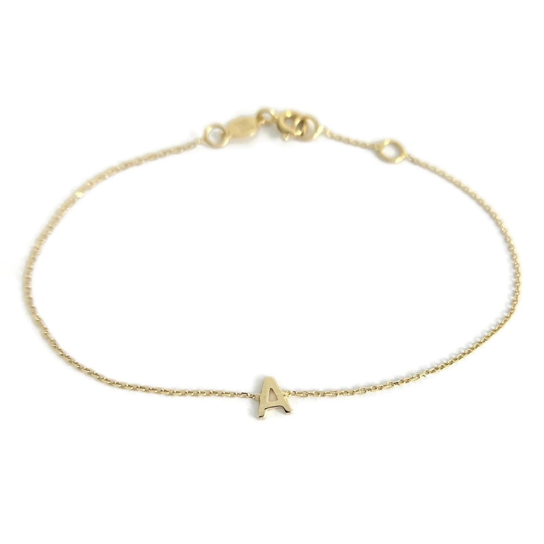 Italian Letter A Initial Chain Bracelet 14K Yellow Gold, .77 Grams: Italian Letter A Initial Chain Bracelet 14K Yellow Gold, .77 Grams This is such a lovely bracelet! Please let us know if you have any questions. Metal: 14K yellow gold Weight: .77 grams Stamped: