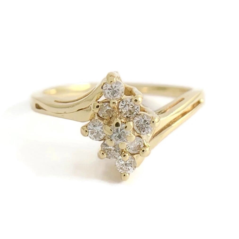 Diamond Marquise Cluster Statement Ring 14K Yellow Gold, .18 CTW, 1.97 Grams: Diamond Marquise Cluster Statement Ring 14K Yellow Gold, .18 CTW, 1.97 Grams This is a gorgeous statement ring! Please feel free to make an offer. Let us know if you have any questions. Diamonds: 9 ro