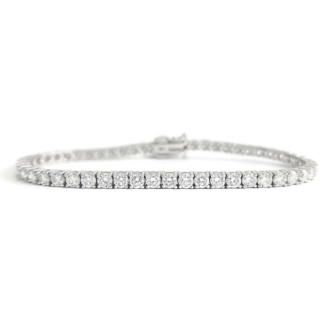 Round Lab-Created Diamond Tennis Bracelet 14K White Gold, 7 Inches, 6.35 CTW: Round Lab-Created Diamond Tennis Bracelet 14K White Gold, 7 Inches, 6.35 CTW This is a gorgeous and classic tennis bracelet! Please let us know if you have any questions :) Diamonds: 53 lab-created