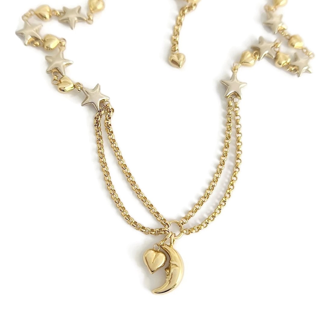 Italian Estate Two-Tone Moon Heart Stars Chain Necklace 14K Yellow Gold, 7.67 Gr: Italian Estate Two-Tone Moon Heart Stars Chain Necklace 18K Yellow Gold, 7.67 Gr This is a classic solid link necklace. Please let us know if you have any questions. Metal: 14K yellow and white gold W
