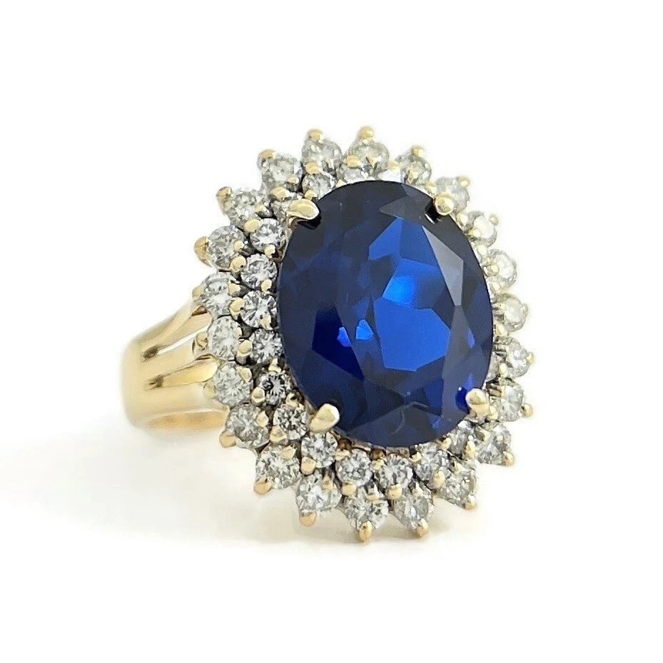 Oval Blue Simulated Sapphire Diamond Double Halo Ring 18K Yellow Gold 4.95 CTW: Oval Blue Simulated Sapphire Diamond Double Halo Ring 18K Yellow Gold 4.95 CTW This is a gorgeous and stunning ring! Please let us know if you have any questions! Gemstones: 1 oval blue simulated sapp