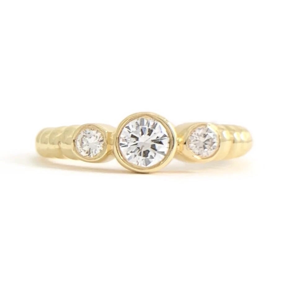 3-Stone Round Bezel Set Diamond Ribbed Ring 14K Yellow Gold .45 CTW: 3-Stone Round Bezel Set Diamond Ribbed Ring 14K Yellow Gold .45 CTW This is a lovely diamond ring! Don't hesitate to ask any questions! Diamonds: .45 ctw; 1 round brilliant cut .30 ct, H, SI1-SI2; 2