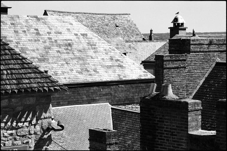 Rooftops, Mont Saint Michel, France 2016 - Silver Gelatin Photograph: Title: Rooftops, Mont Saint Michel, France 2016 - Silver Gelatin Photograph Description: 20 x 16 in Medium: Rooftops, Mont Saint Michel, France 2016 - Silver Gelatin Photograph - Limited Edition of 10