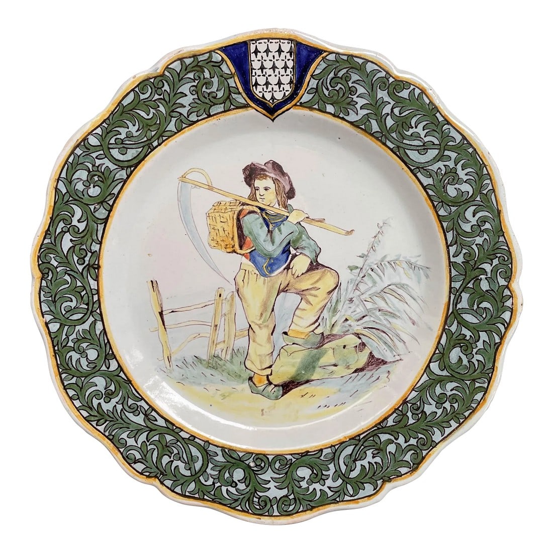 19th Century French Porquier Beau Quimper Faience Plate: A 19th century French Porquier Beau Quimper faience plate with a young farmer holding a scythe. Foliate border with Brittany coat of arms. Good details. Minor chips to glaze on back. Mark verso: PB