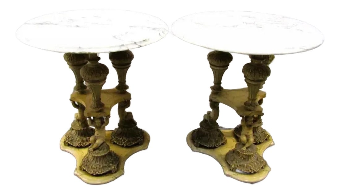 1940s Pair of Italian Regency Florentine Marble Top Side Tables With Triple Cherub Base: Pair of Italian Regency Florentine Marble Top Side Table with Triple Cherub Base Marble top. Cast metal base with marbled look. Each cherub serves as a support to the top. It appears they are holding