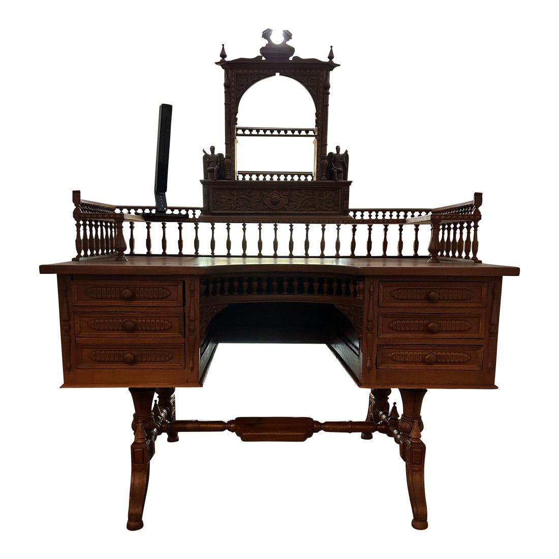 Late 19th Century Jeweler's Workbench With Carved Angel Drawer Front: This remarkable example of a jeweler's workbench transcends its utilitarian origins, incorporating decorative artistry into a professional workstation. The standout feature"”a carved angel
