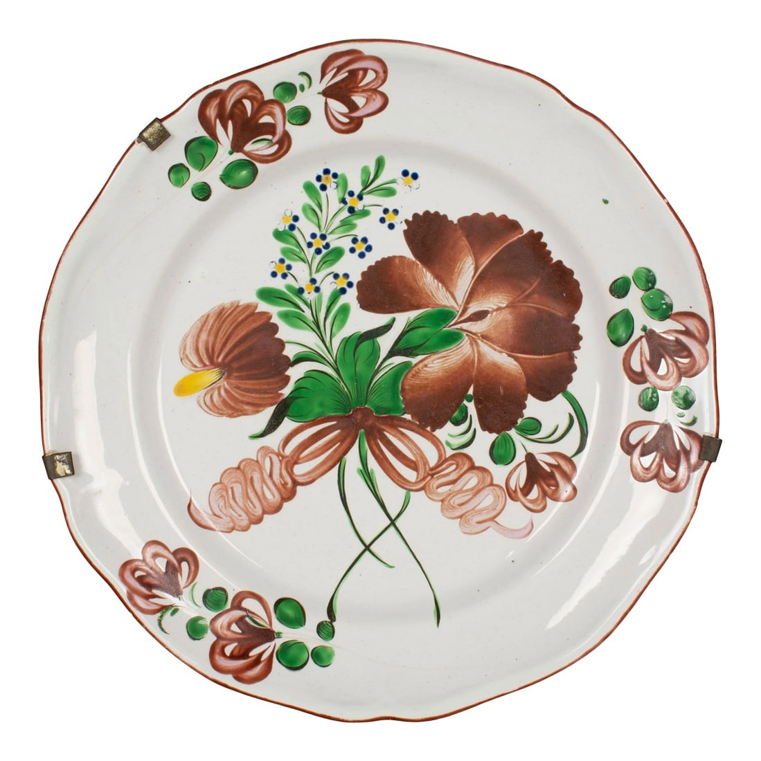 19th Century French Faience Decorative Plate: A 19th century French faience charger or platter with typical hand painted burgundy floral decoration from St Clement in the East of France. Minor glaze loss. Old brass plate hanger is still
