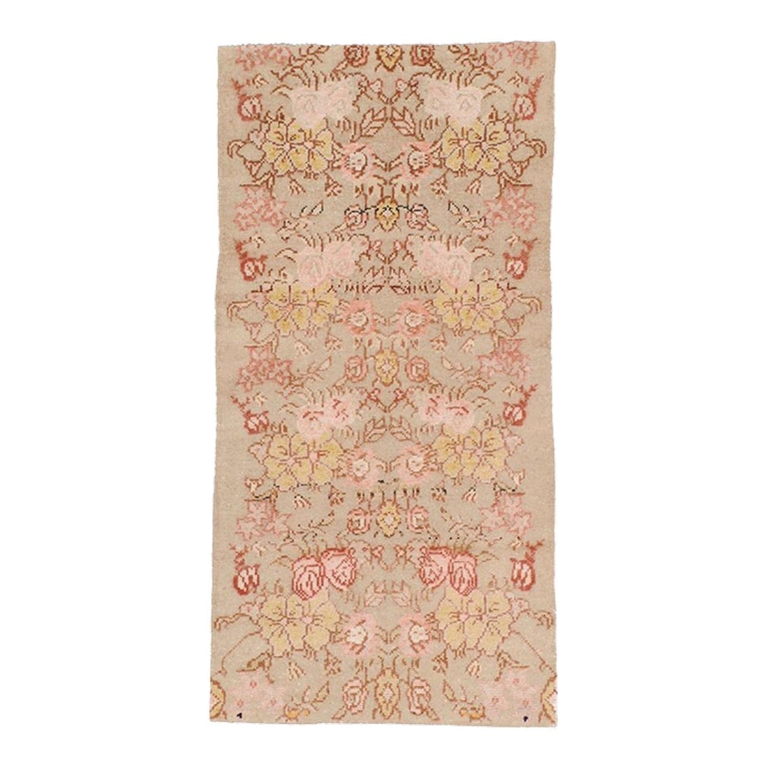 Galerie Shabab Collection Mid-20th Century Turkish Anatolian Throw Rug: This mid-20th century Turkish Anatolian rug, measuring 2' 8" x 5' 4", showcases a soft, romantic palette and a graceful floral arrangement characteristic of regional workshop production during this