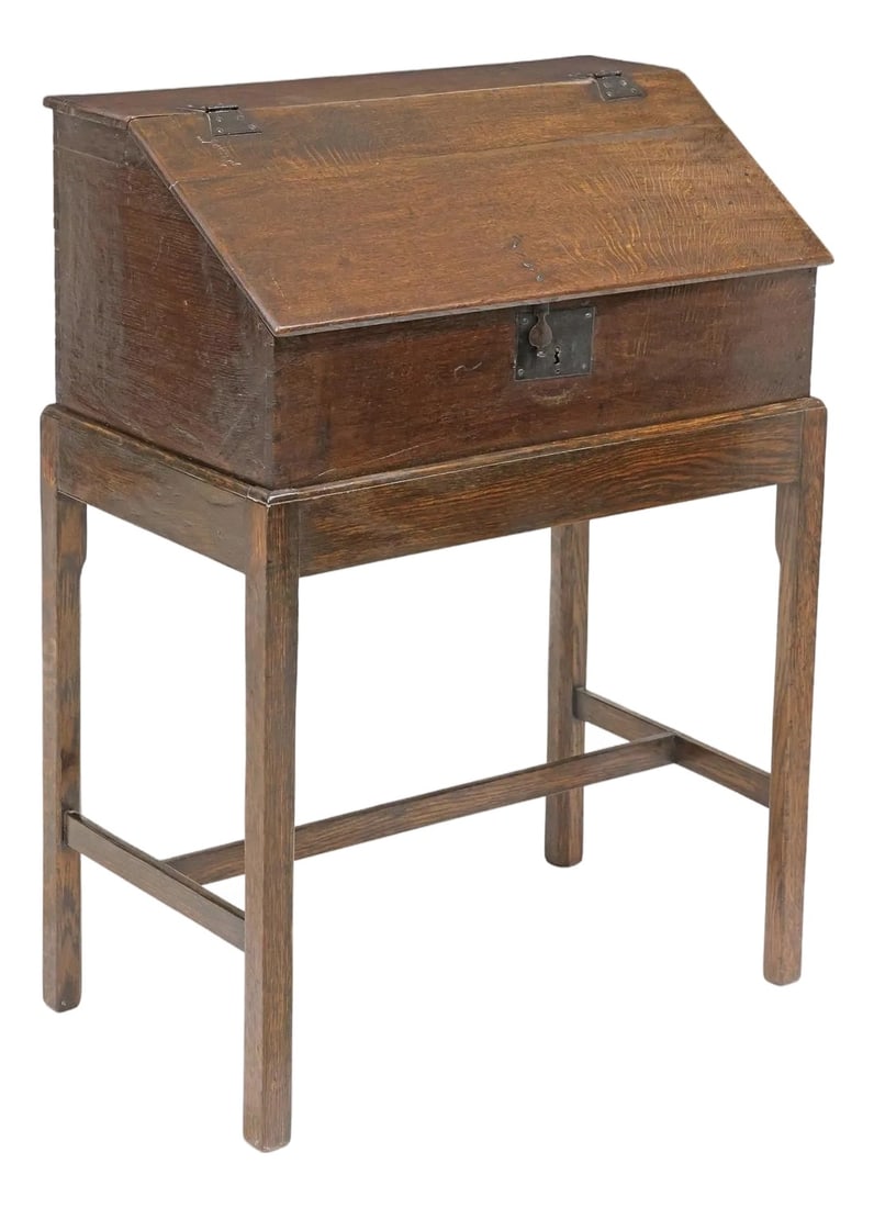 Antique Late 18th Century English Georgian Oak Box on Stand: A fine English Georgian oak slant-front box on stand, dating to the late 18th or early 19th century.. This versatile piece features a hinged, sloping writing surface that opens to reveal a spacious in