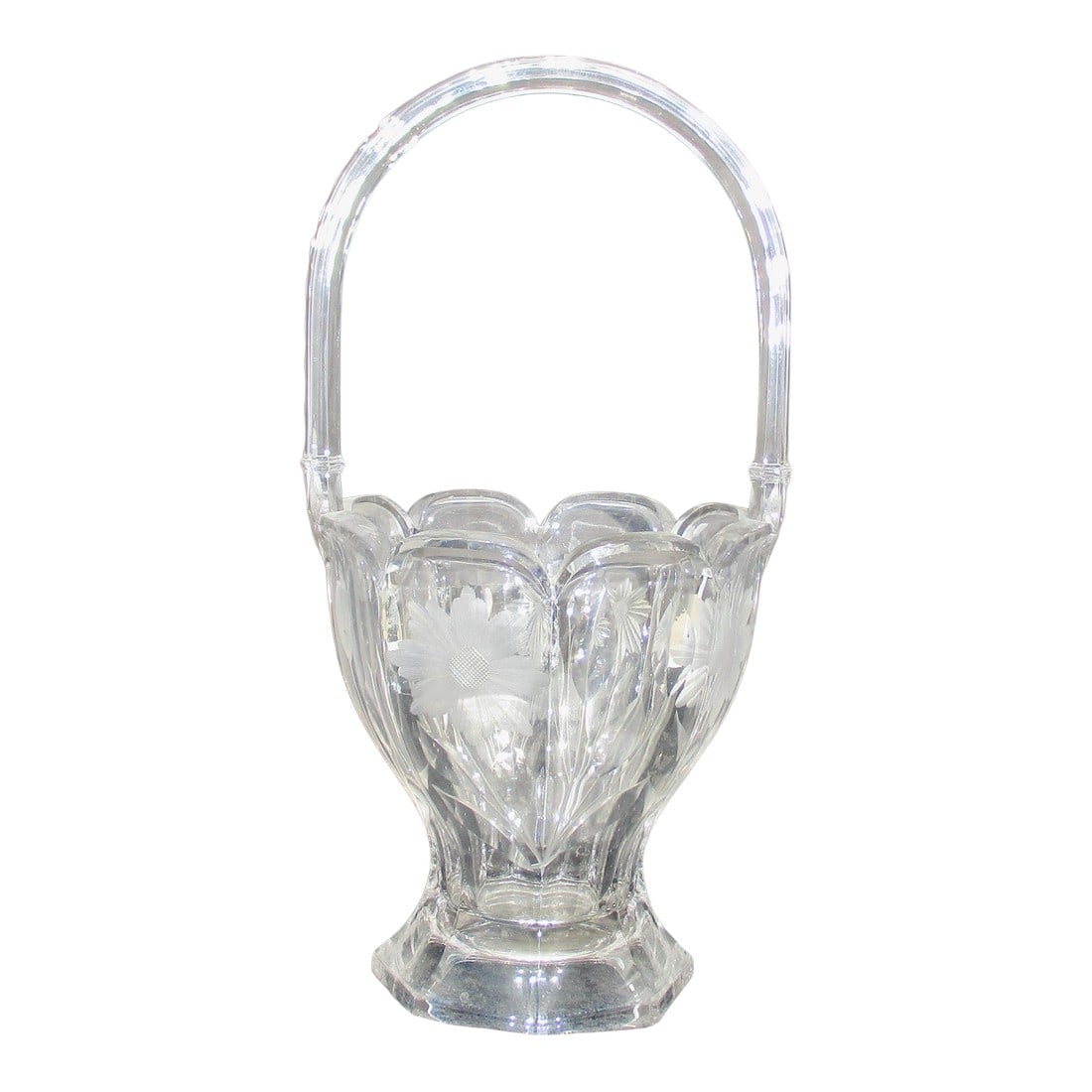 1920s Vintage Heisey Glass Basket Vase: Cut Heisey Glass basket vase. Eight-sided handled basket with a floral design carved into opposing panels. Tall, elegant centerpiece with a good weight ot balance a wide bouquet or arrangements. It ot