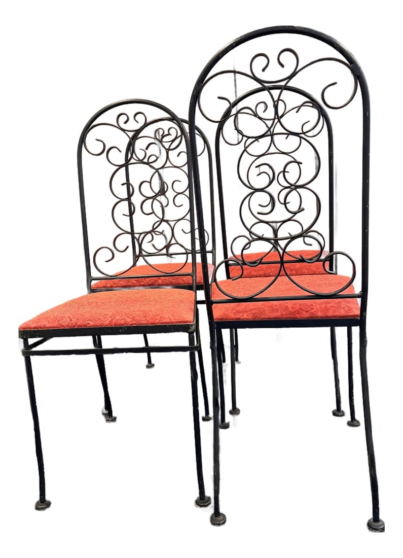Set of 4 - Arthur Umanoff Wrought Iron Spanish Dining Chairs With Leather Embossed Seats: Arthur Umanoff black iron dining chairs from Spain with a scrawling back design compliments new leather embossed seats perfect for upscaling a dining room table. Condition: Alterations: Original