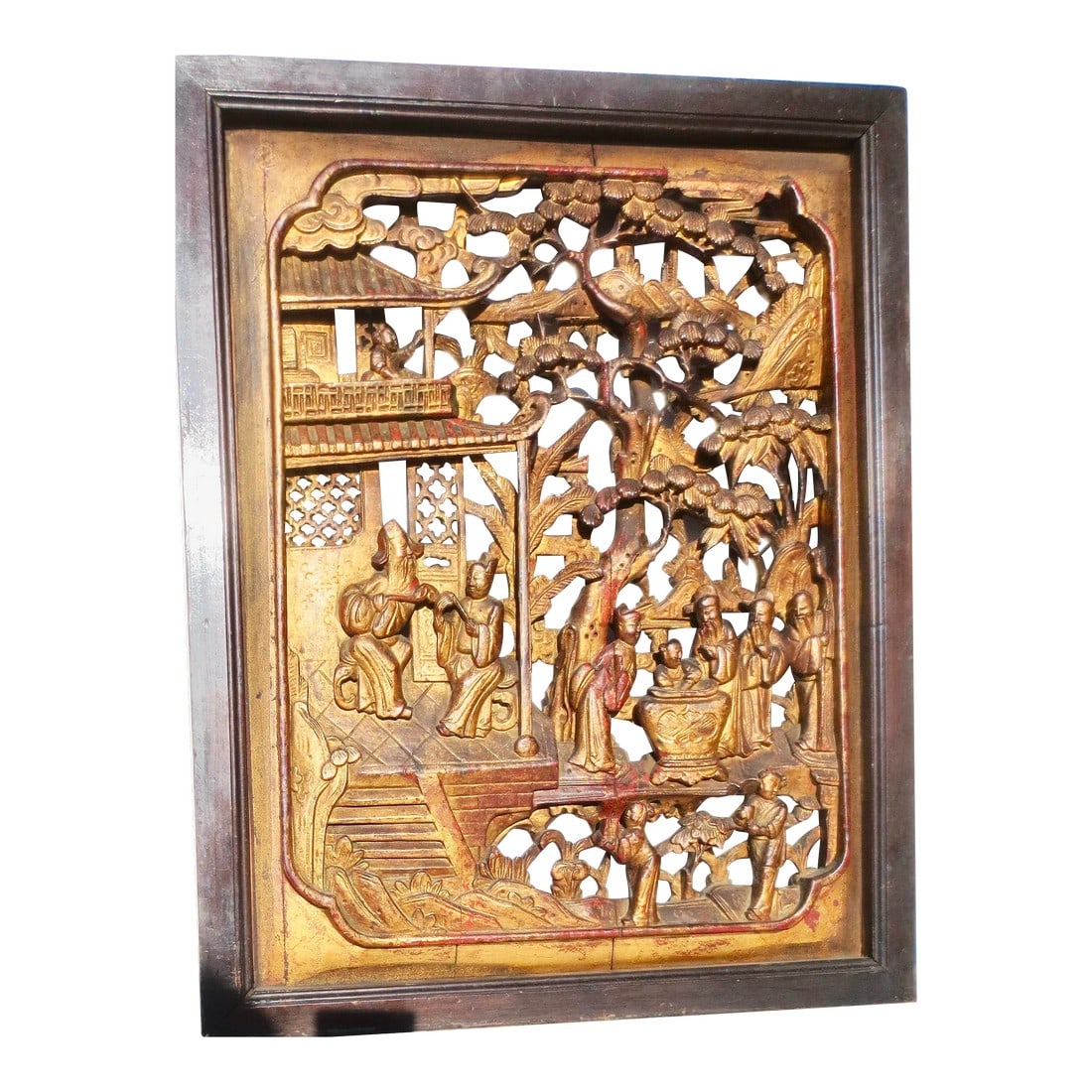 Antique Chinese Wood Carved Scenic Panel: Antique Chinese carved wooden Panel. Gilt wood surface depiction of a pavilion scene of the life of a scholar inside his home, with various vignettes of life around him, Tutors attend children, and