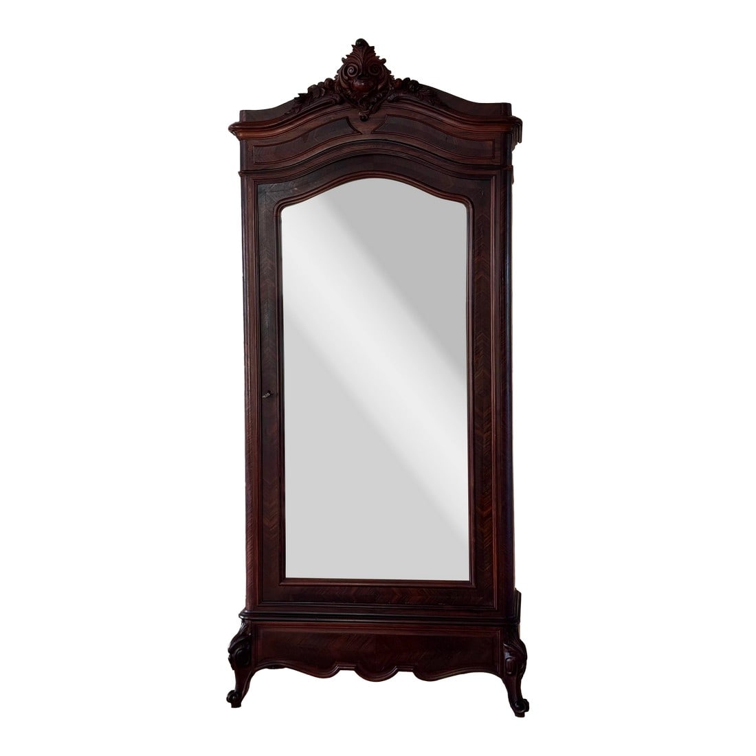 19th Century French Louis XV Hand Carved Walnut Armoire Vitrine With Single Glass Door: An exceptional 19th century French armoire vitrine, beautifully crafted in richly toned walnut and featuring an elegant single glass door. The case is framed by finely carved detailing, including a