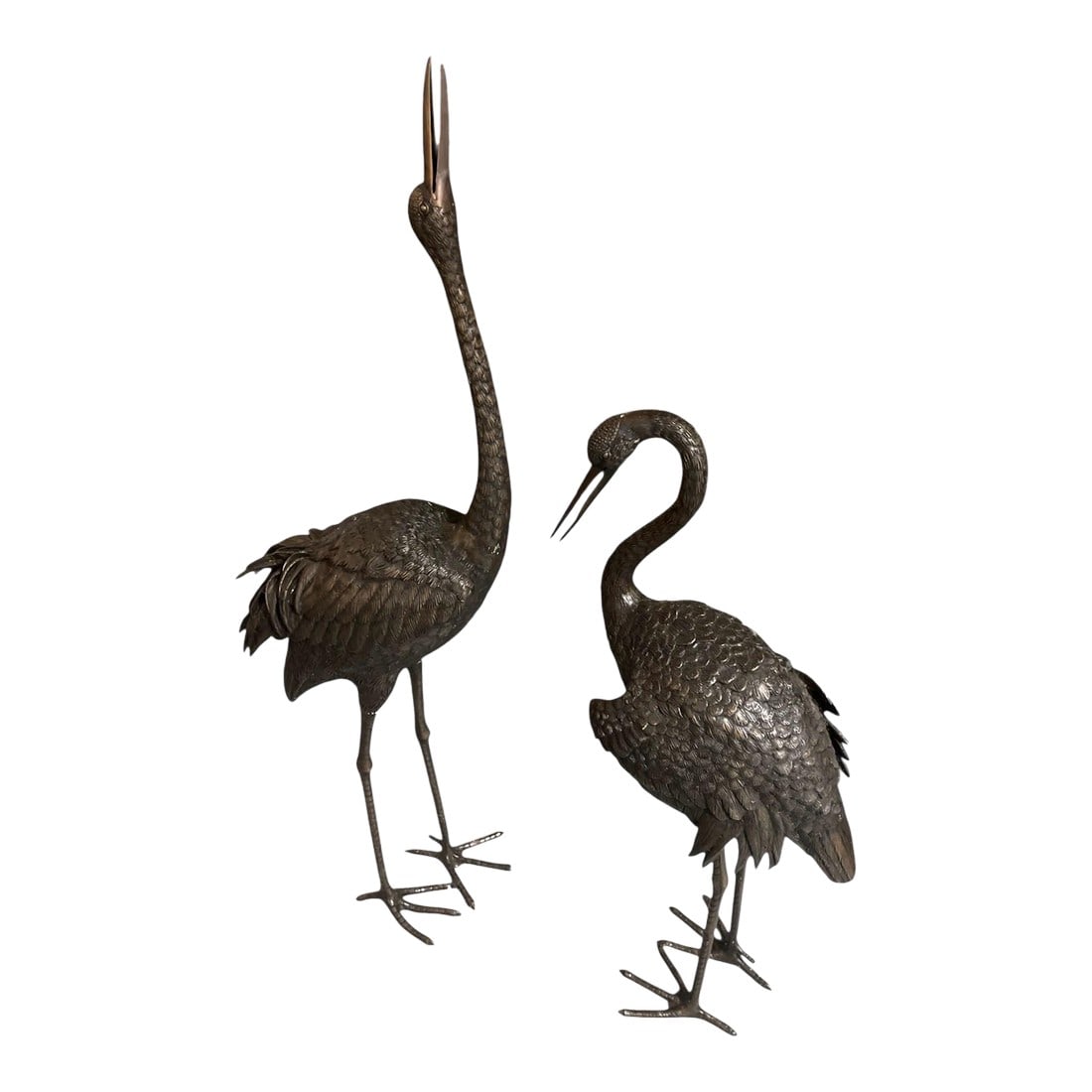 Pair of Vintage Hollywood Regency Bronze Garden Cranes: These elegant bronze crane sculptures, likely dating from the late 19th-century Meiji period or early 20th century, exhibit the sophisticated realism and fine craftsmanship characteristic of Japanese 