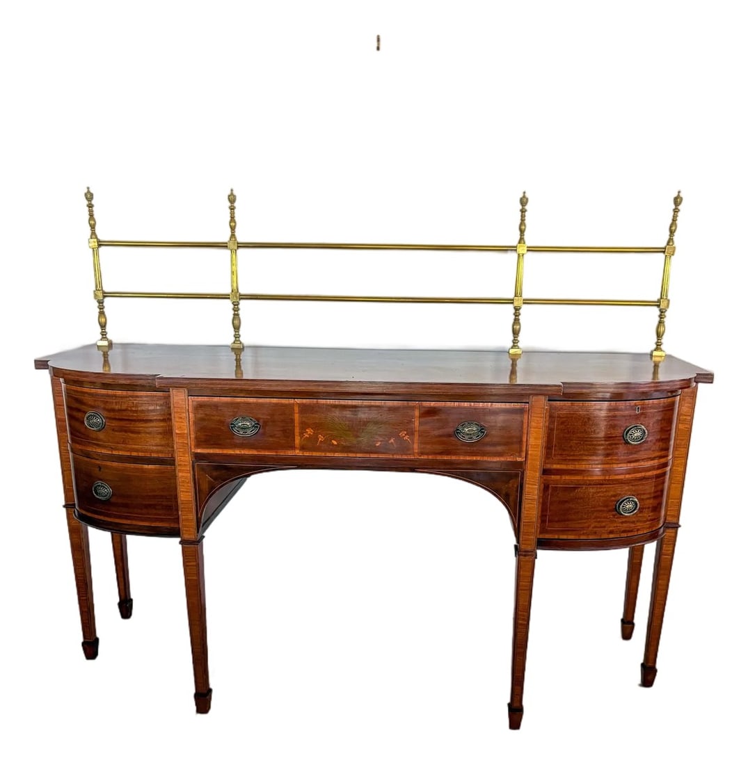 English George III Inlaid Sideboard With Banding and Marquetry, 19th Century: This exceptional 19th-century sideboard is a masterclass in George III neoclassical design, echoing the refined elegance of both Sheraton and Hepplewhite. Crafted from rich, honey-toned mahogany, the