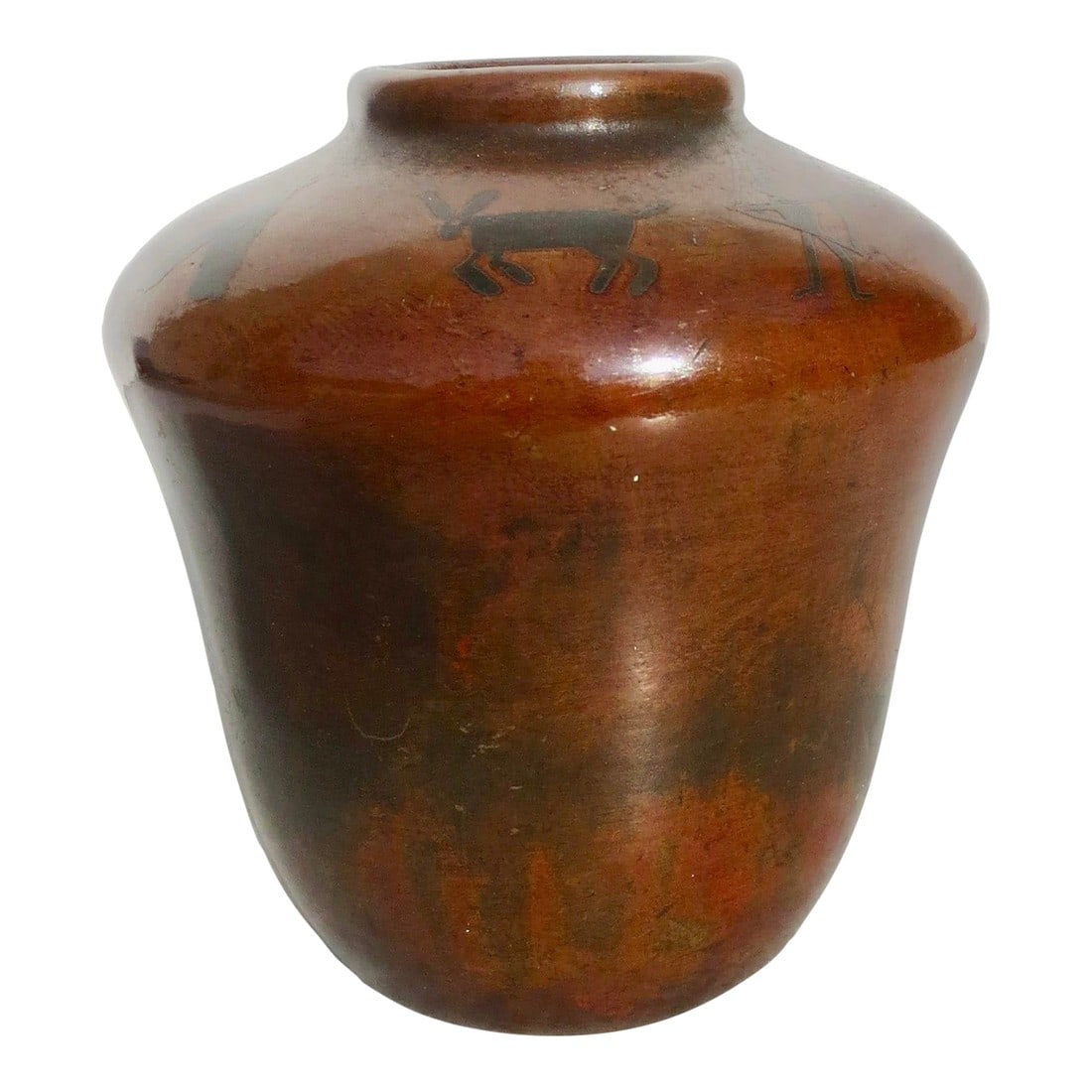 MCM Bronze Vase With Tribal Motif Circa 50s: Rich coppery bronze vase with the style of Swedish Modern and a tribal series of pictograph imagery. A beautiful vase with a great feel in the hand, smooth and fluid. No maker or studio marks, but